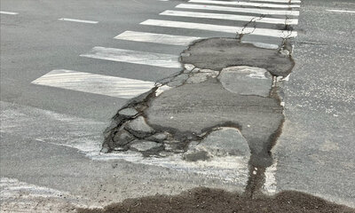 Schade aan asfaltering